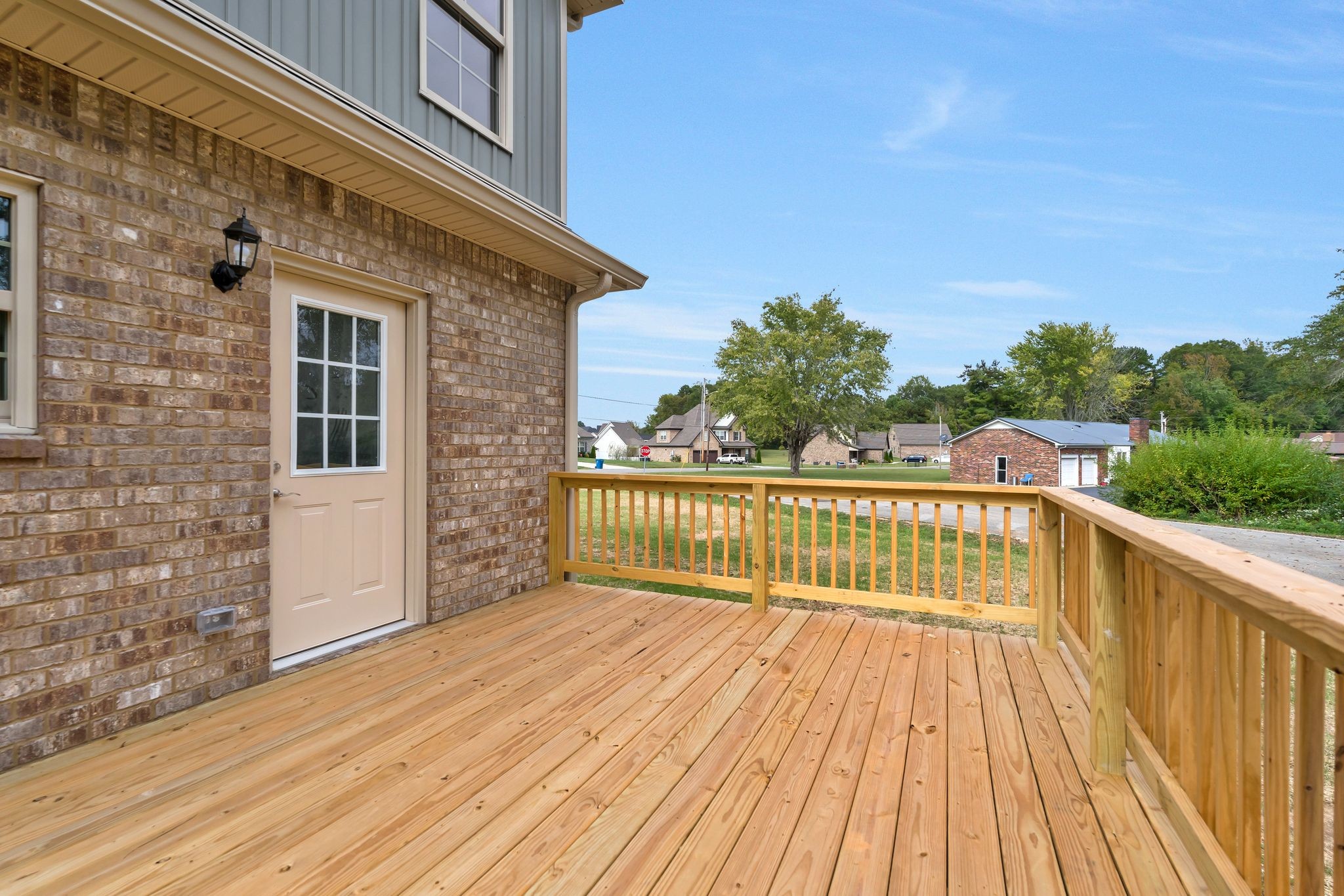 383 Doak Road, Unit 40 Manchester, TN 37355 - Photo 28 of 32 a view of balcony with wooden floor and fence
