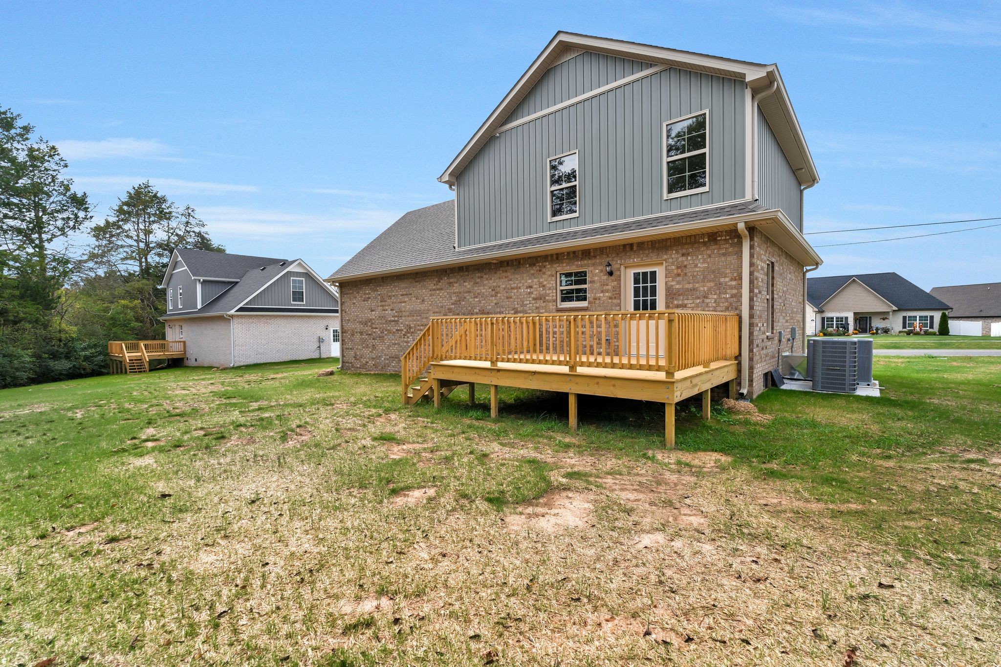 383 Doak Road, Unit 40 Manchester, TN 37355 - Photo 32 of 32 a backyard of a house with yard and trampoline
