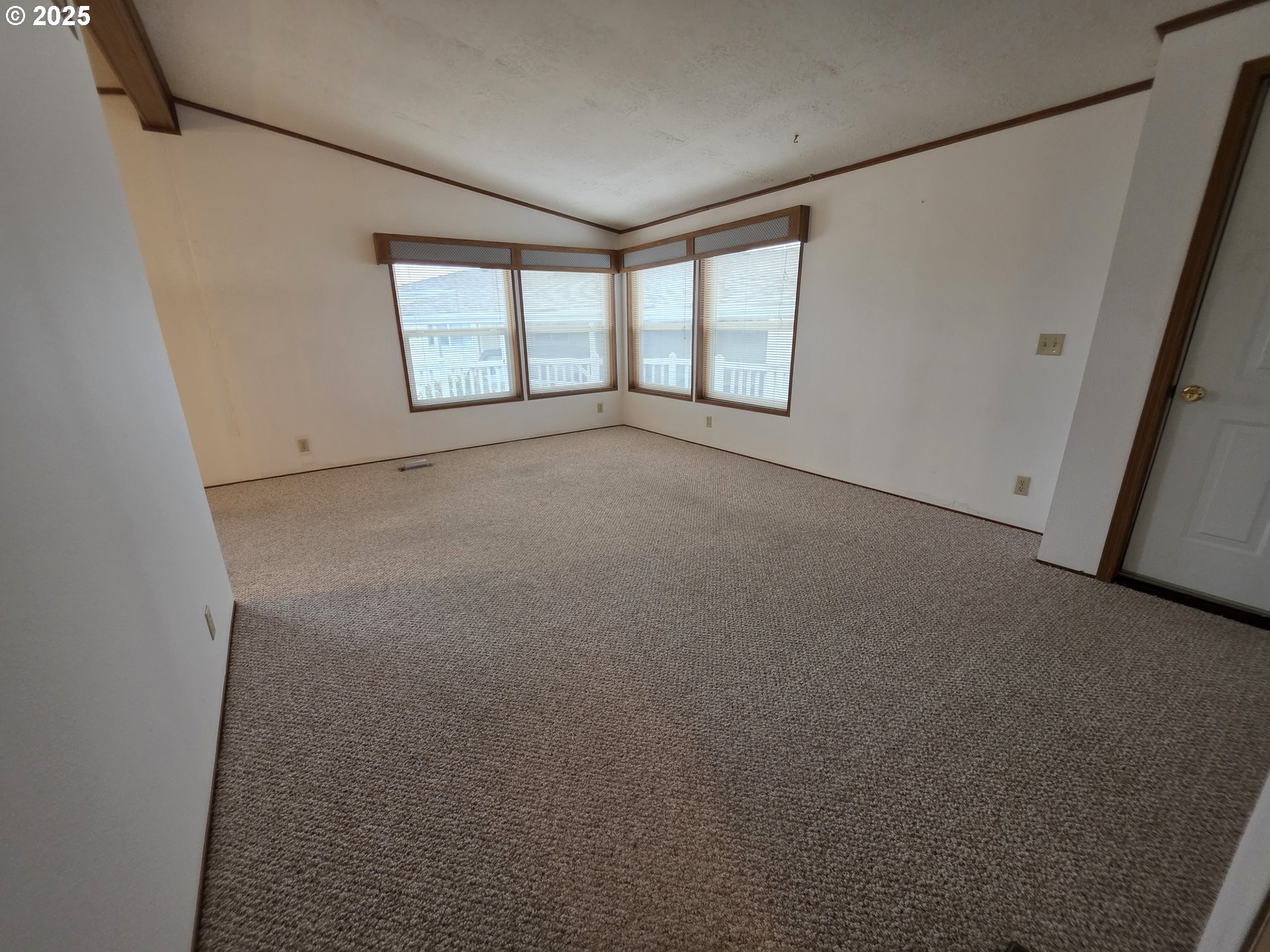 1506 Pioneer Circle Forest Grove, OR 97116 - Photo 13 of 28 an empty room with windows