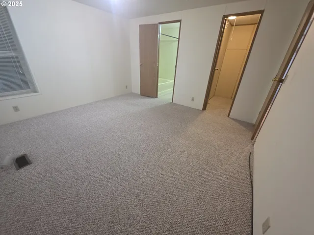 a view of a room with windows