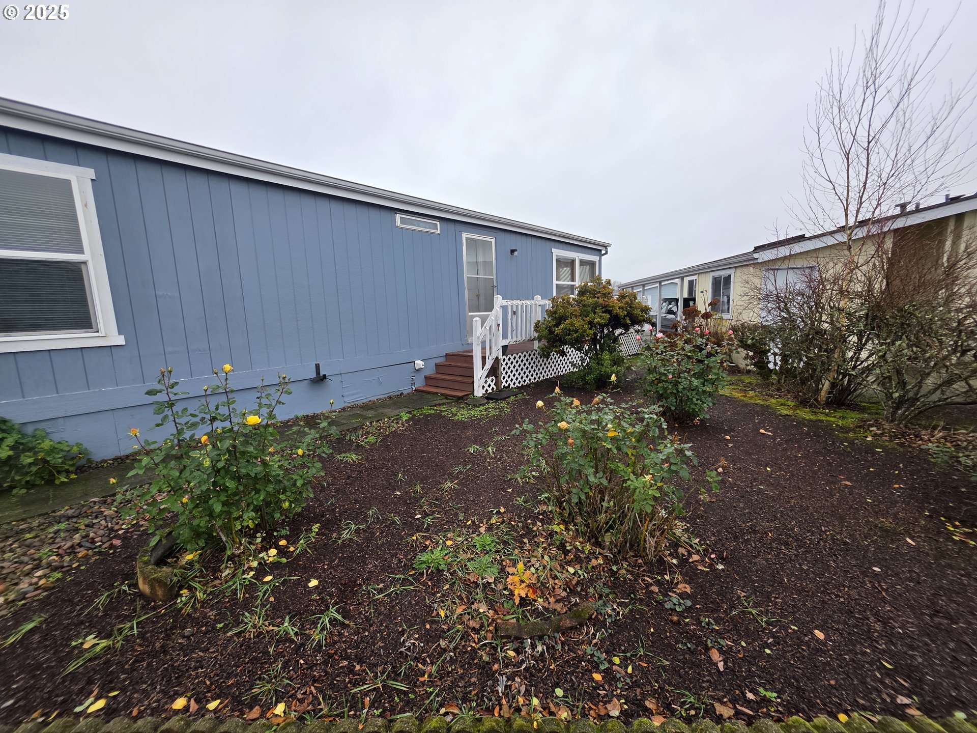 1506 Pioneer Circle Forest Grove, OR 97116 - Photo 26 of 28 a view of a house with a backyard