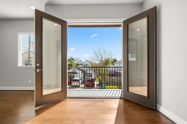 a view of a room with a large window