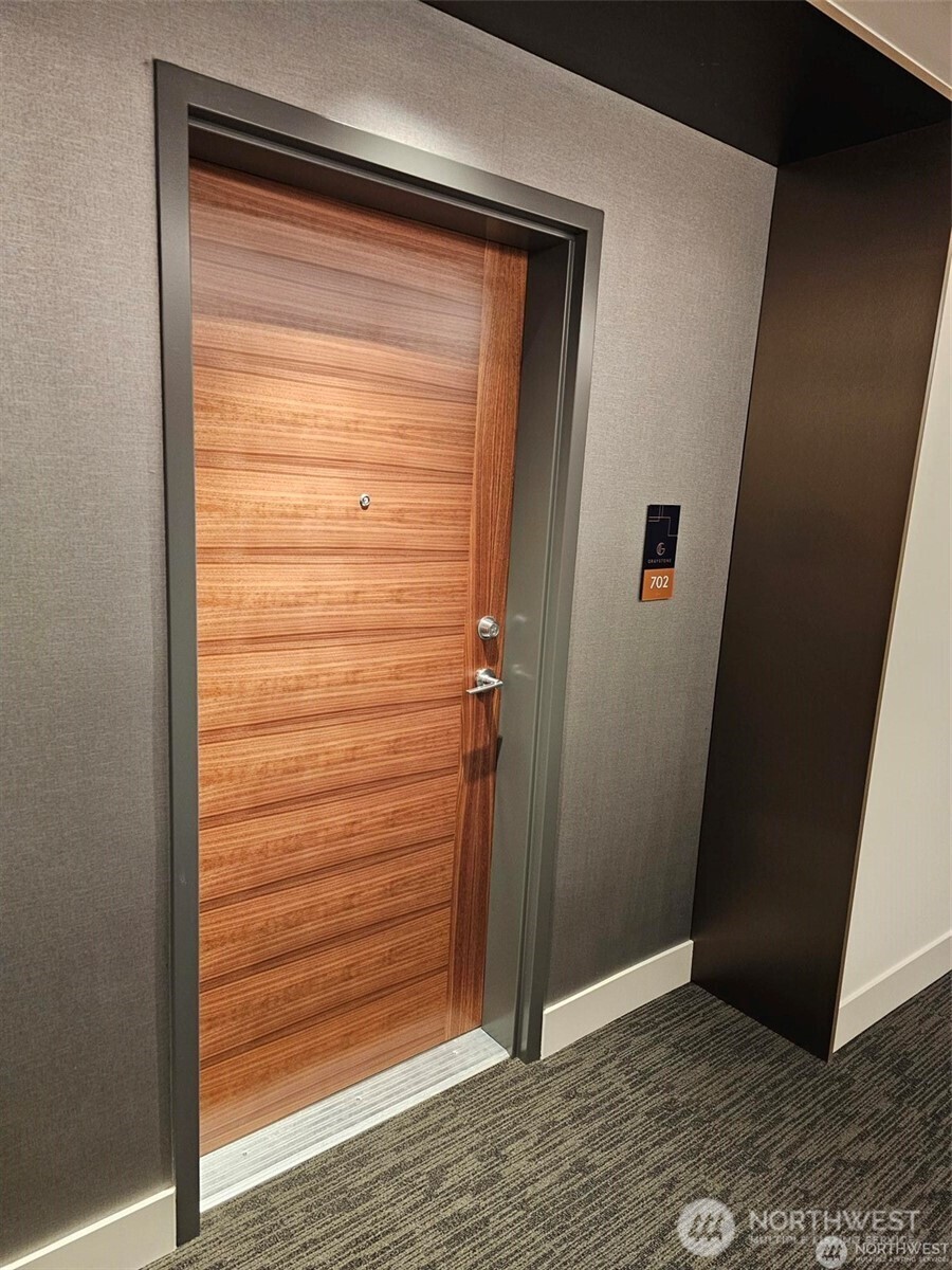 800 Columbia Street, Unit 702 Seattle, WA 98104 - Photo 3 of 15 a view of walk in closet