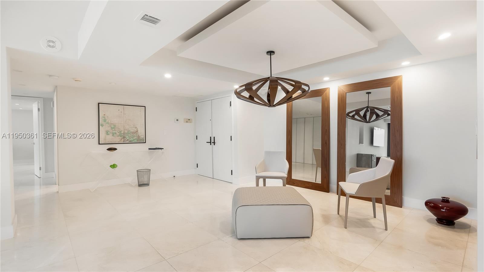 3 Grove Isle Drive, Unit C1407 Miami, FL 33133 - Photo 9 of 45 a view of a lobby with furniture