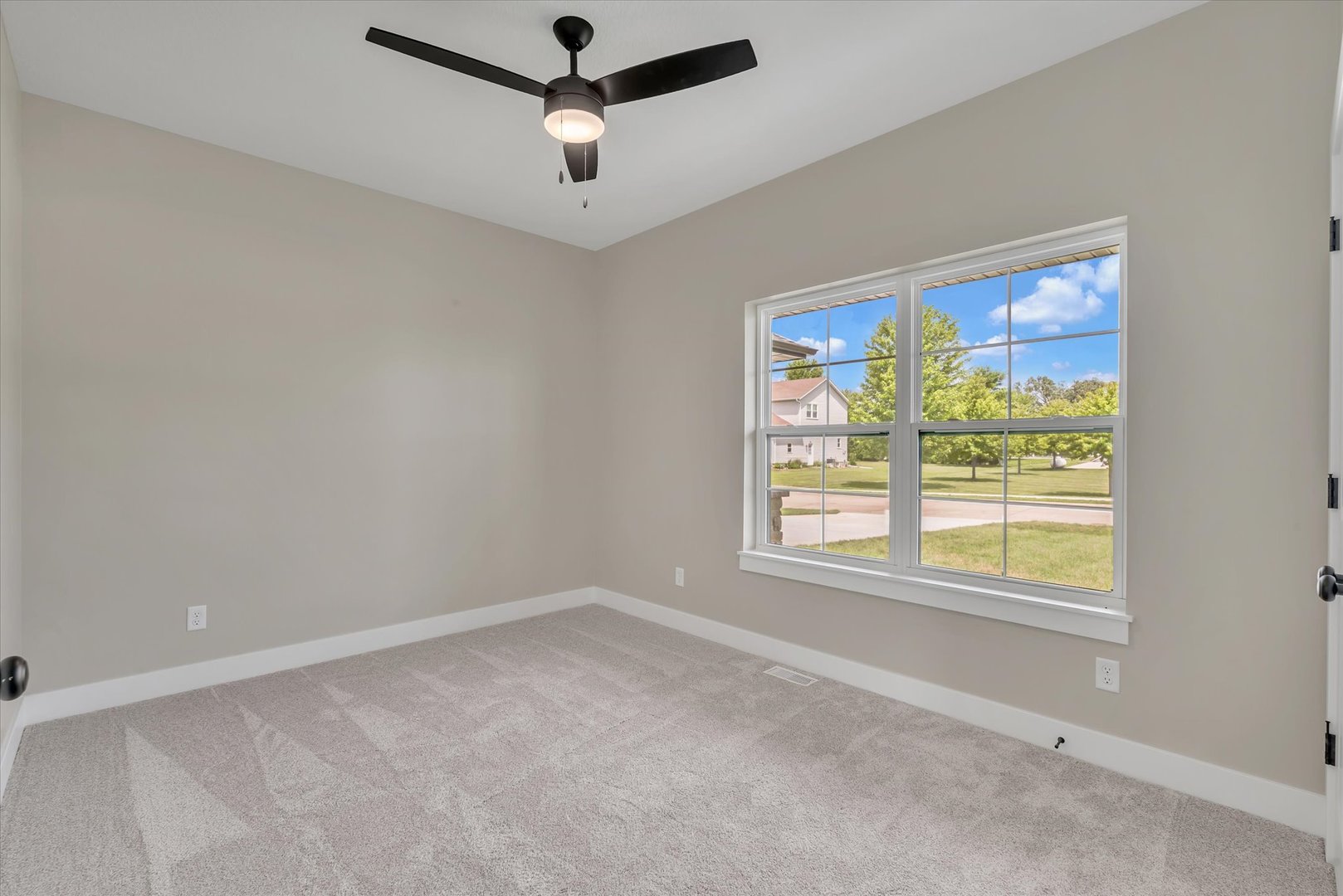 455 Rhonda Road New Liberty, IA 52765 - Photo 46 of 54 an empty room with a window