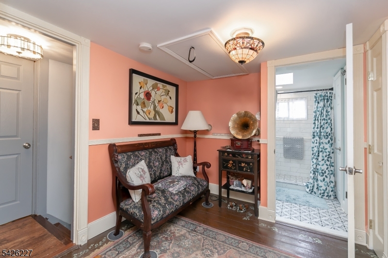 36 Main Street Flanders, NJ 07836 - Photo 23 of 49 a bedroom with a bed and wooden floor