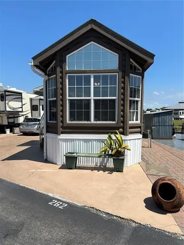 a view of a house with a patio