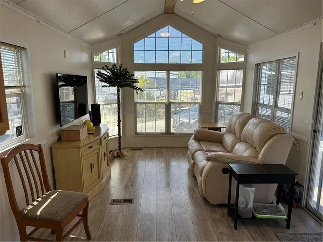 a kitchen with a stove top oven sink and cabinets