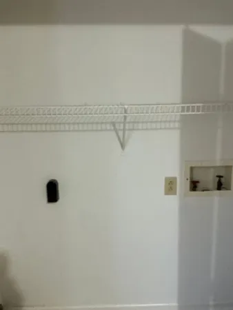 a view of a balcony with wooden floor