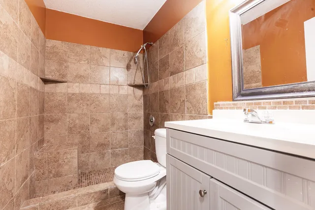 a bathroom with a sink and a toilet