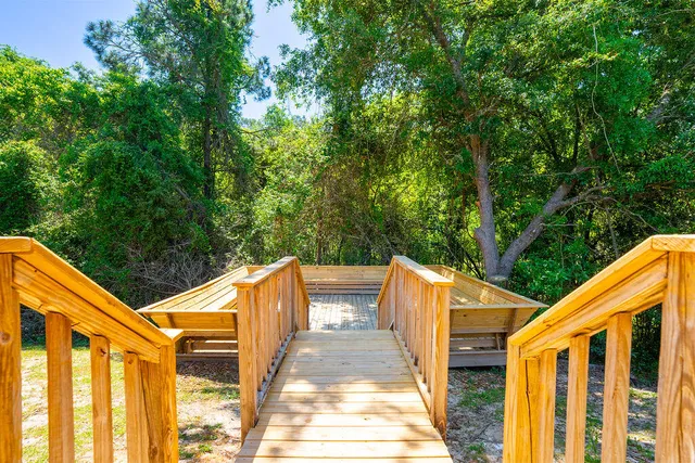 a view of outdoor space with deck and yard