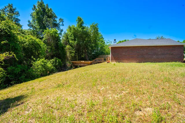 a view of a yard with an outdoor space