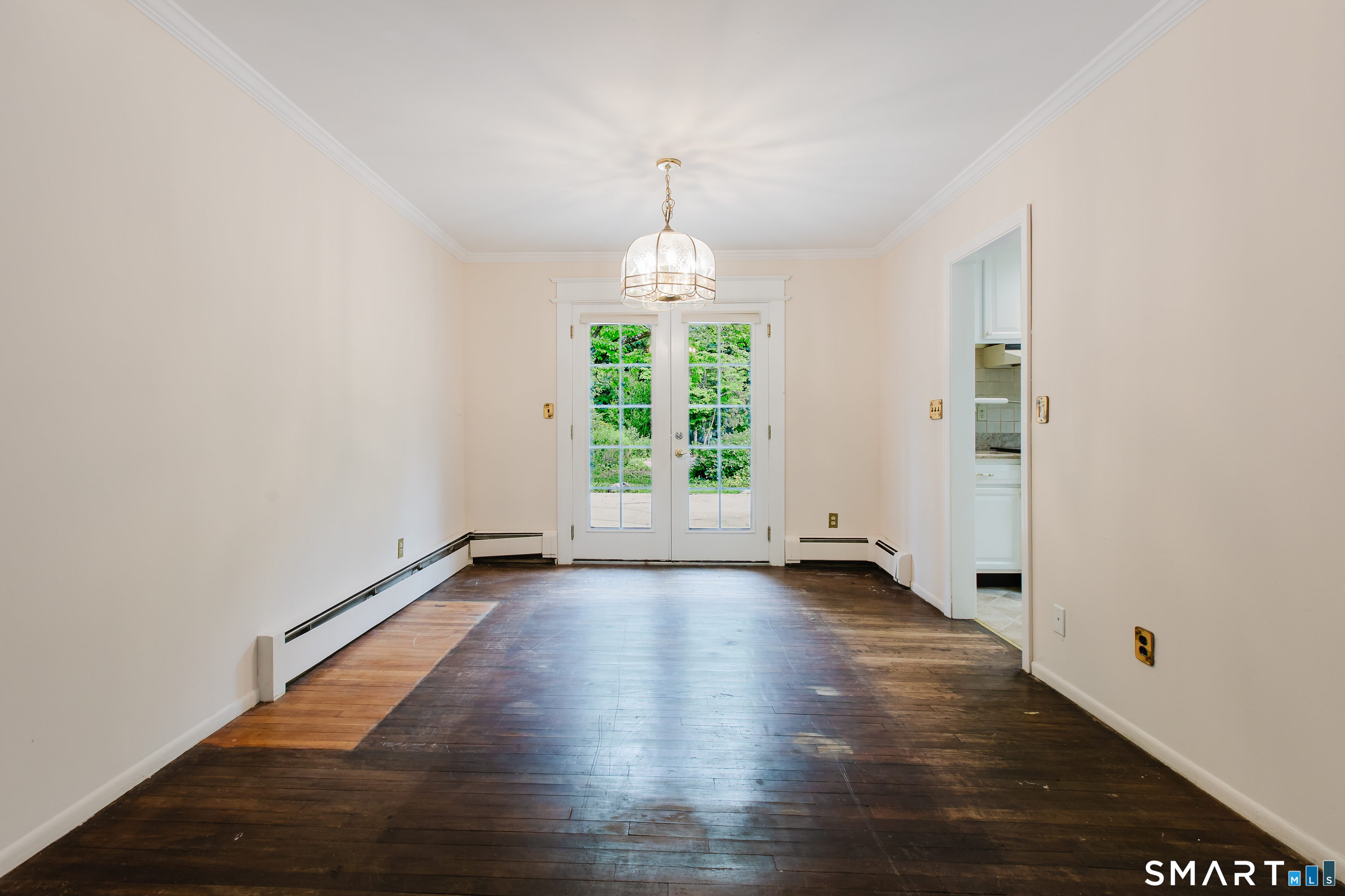 75 Westwood Road Stamford, CT 06902 - Photo 10 of 40 Dining Room opens through french doors to backyard terrace