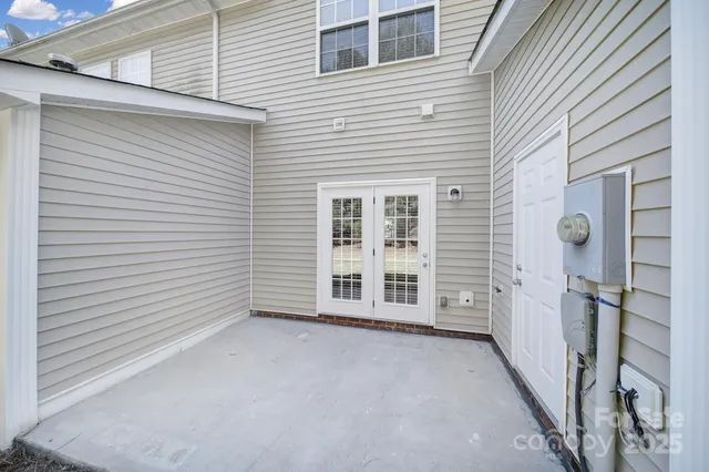 a view of a house with a yard and garage