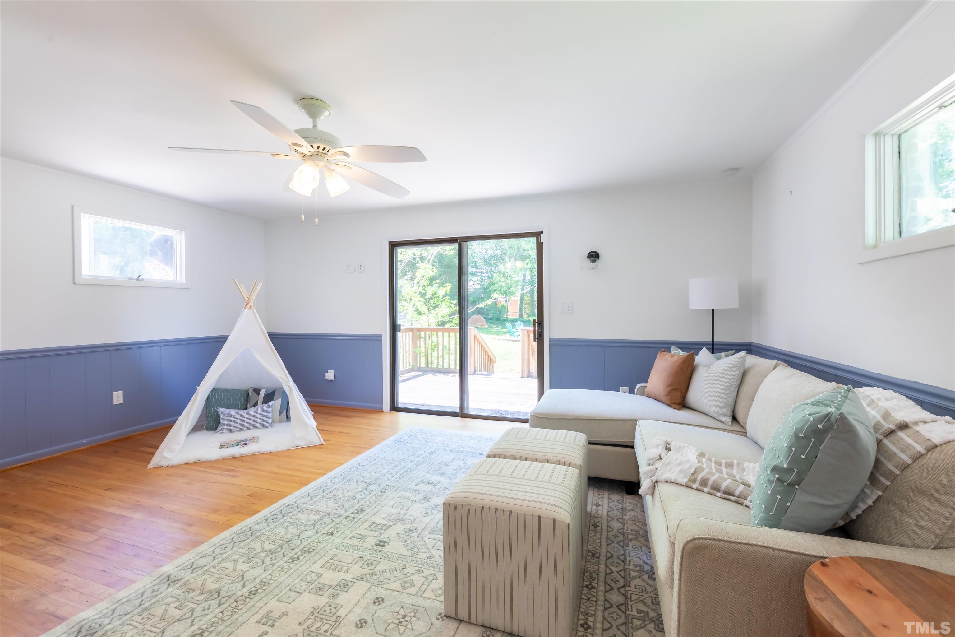 1433 Chester Road Raleigh, NC 27608 - Photo 21 of 33 a living room with furniture and a window