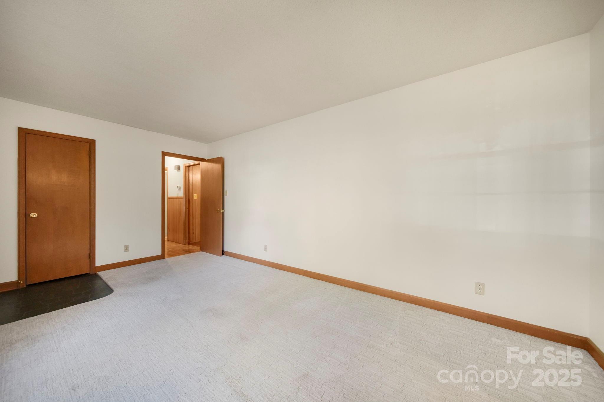 201 Smith Street, Unit 13 Wingate, NC 28174 - Photo 24 of 46 an empty room with window