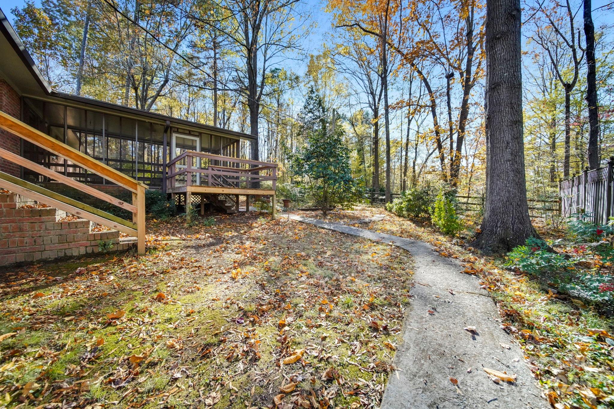 201 Smith Street, Unit 13 Wingate, NC 28174 - Photo 39 of 46 a view of a house with a yard