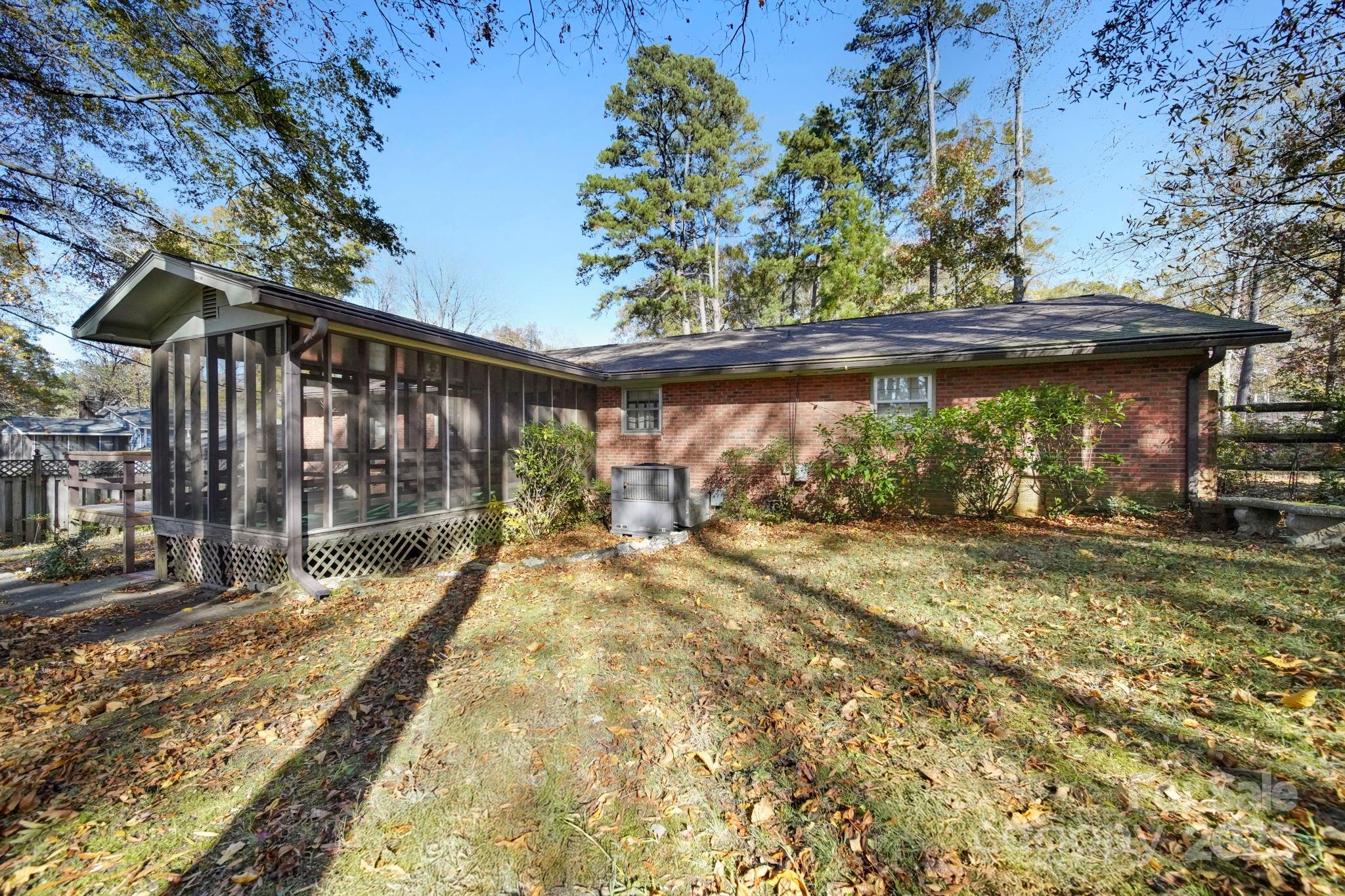 201 Smith Street, Unit 13 Wingate, NC 28174 - Photo 42 of 46 a view of a porch with a yard