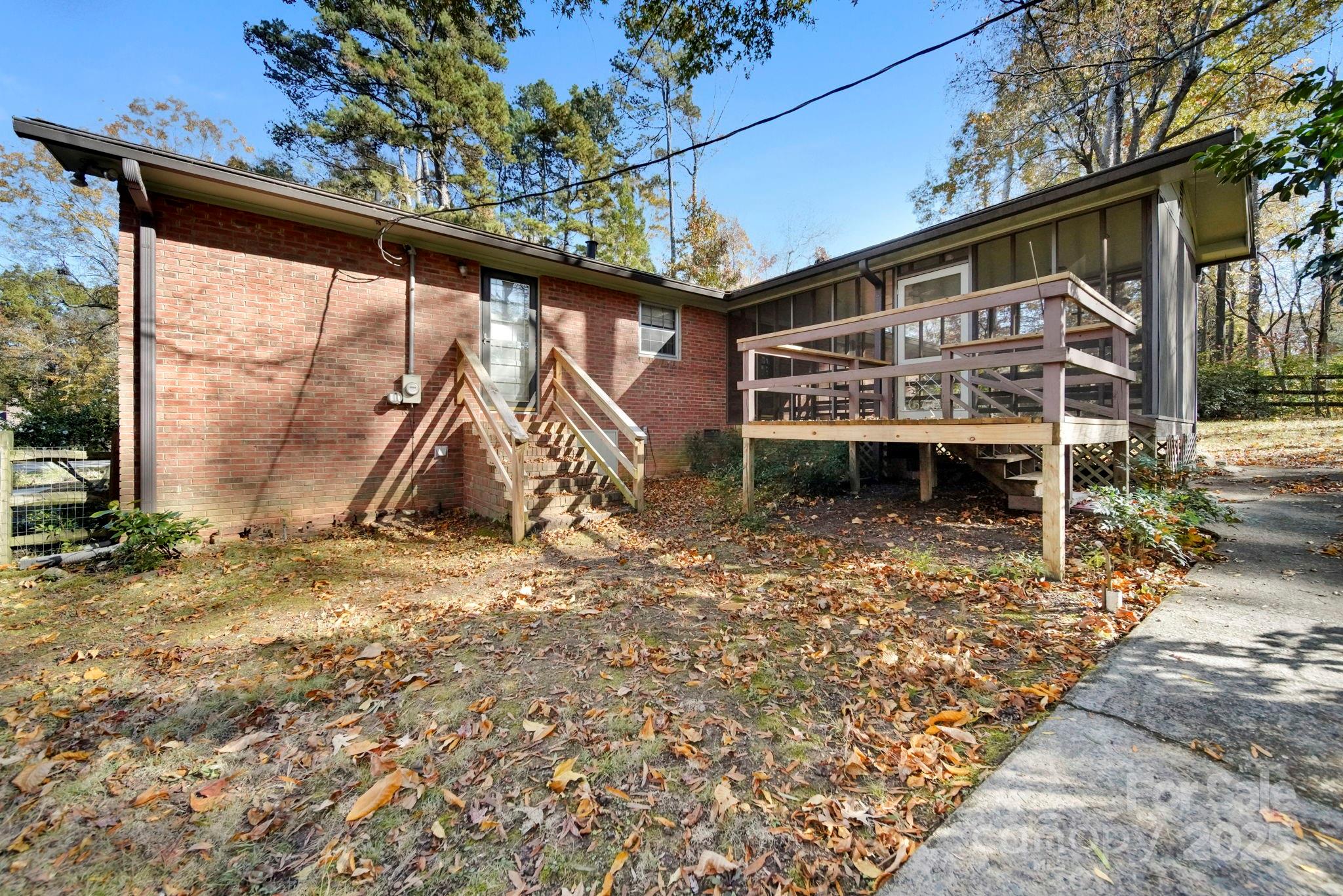 201 Smith Street, Unit 13 Wingate, NC 28174 - Photo 43 of 46 a view of a house with a yard