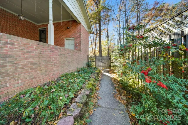 a view of a backyard of the house