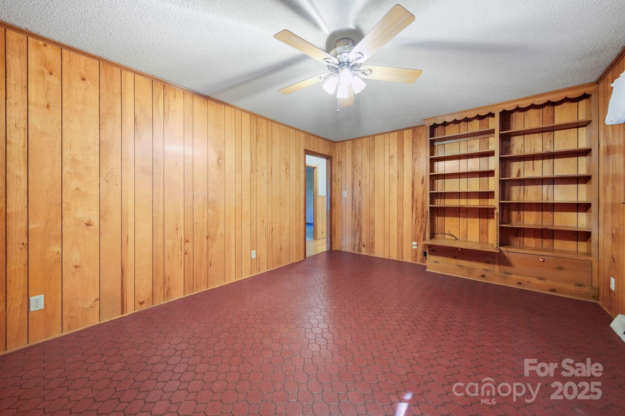 201 Smith Street, Unit 13 Wingate, NC 28174 - Photo 5 of 46 a view of an empty room with a window