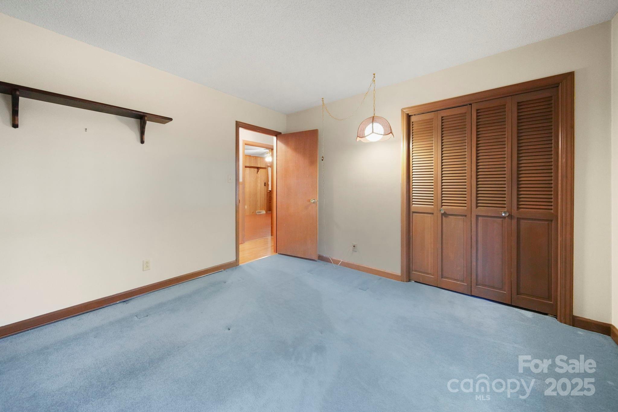 201 Smith Street, Unit 13 Wingate, NC 28174 - Photo 10 of 46 a view of an empty room