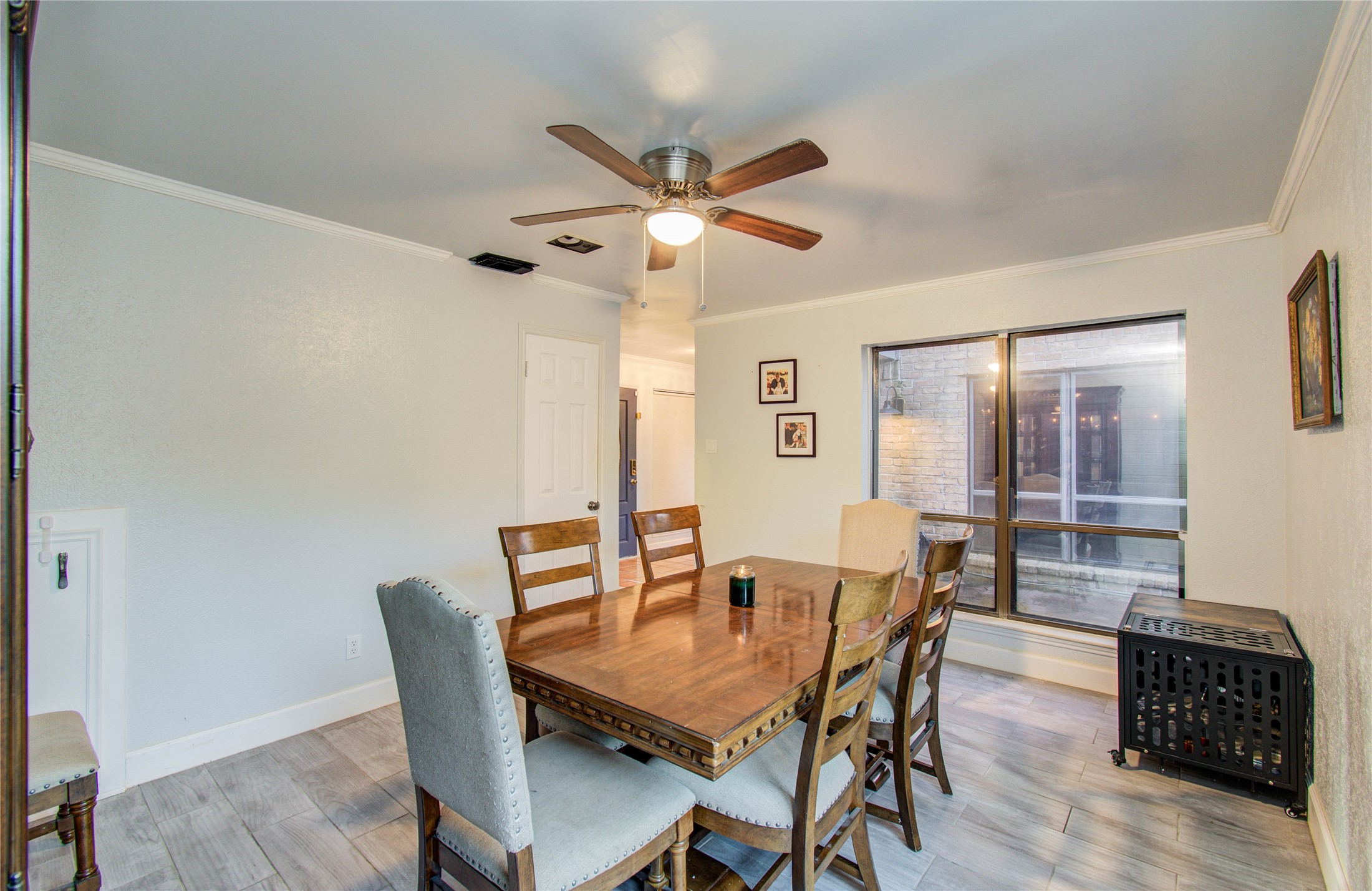 16707 Fernwood Way Houston, TX 77058 - Photo 12 of 46 a dining room with furniture and window