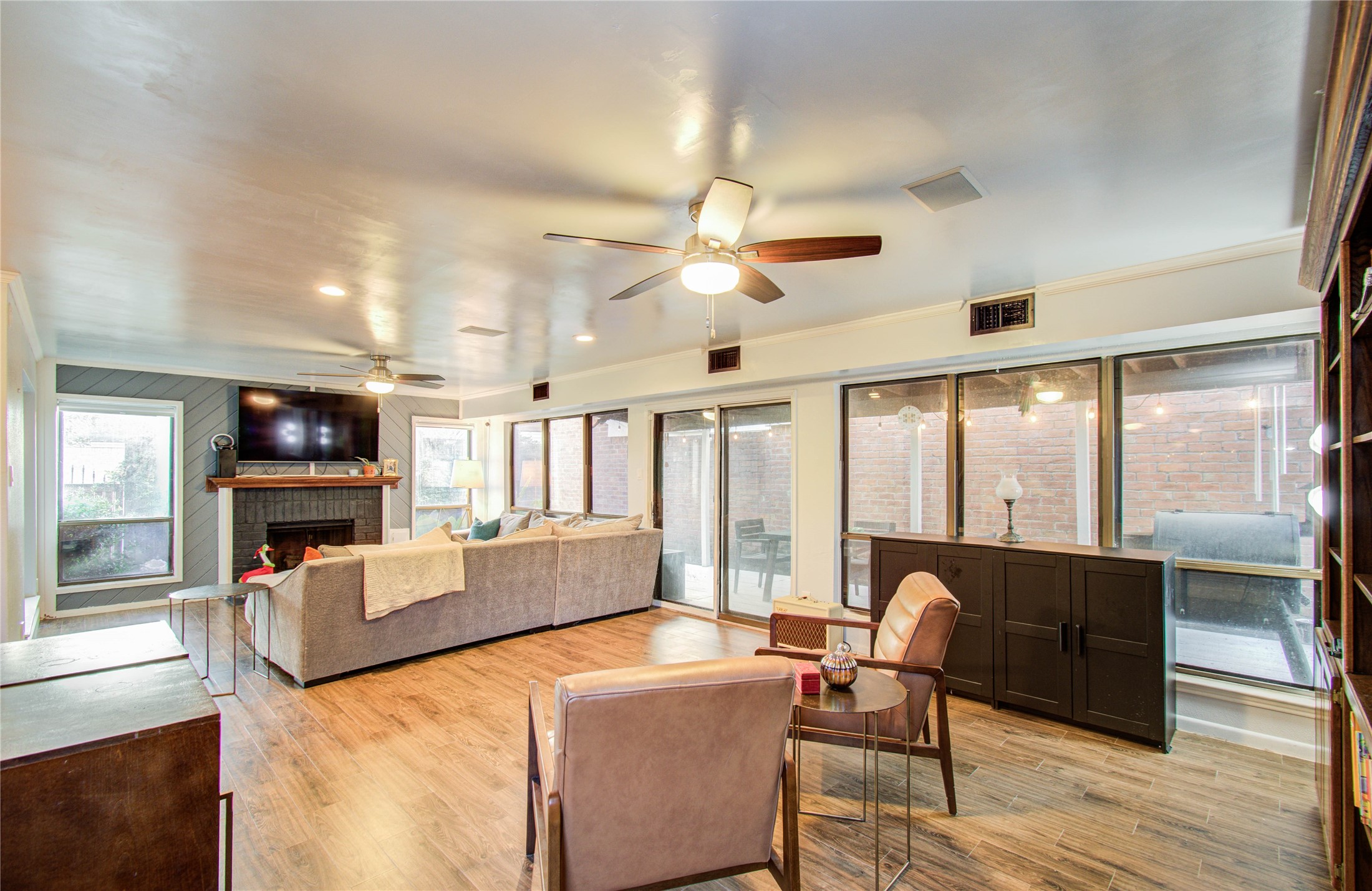 16707 Fernwood Way Houston, TX 77058 - Photo 20 of 46 a living room with furniture and a flat screen tv