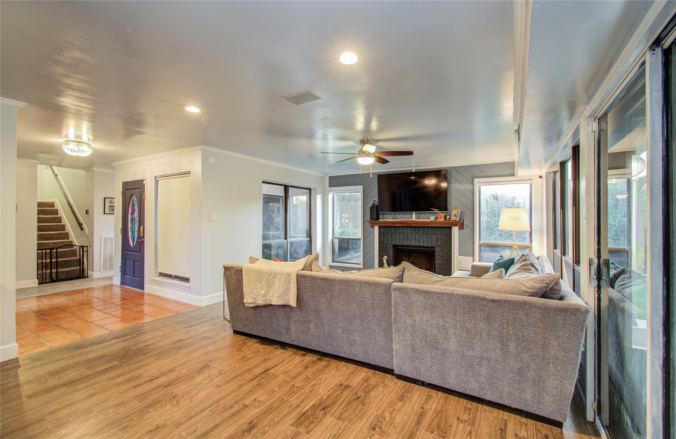 16707 Fernwood Way Houston, TX 77058 - Photo 22 of 46 a living room with furniture and a fireplace