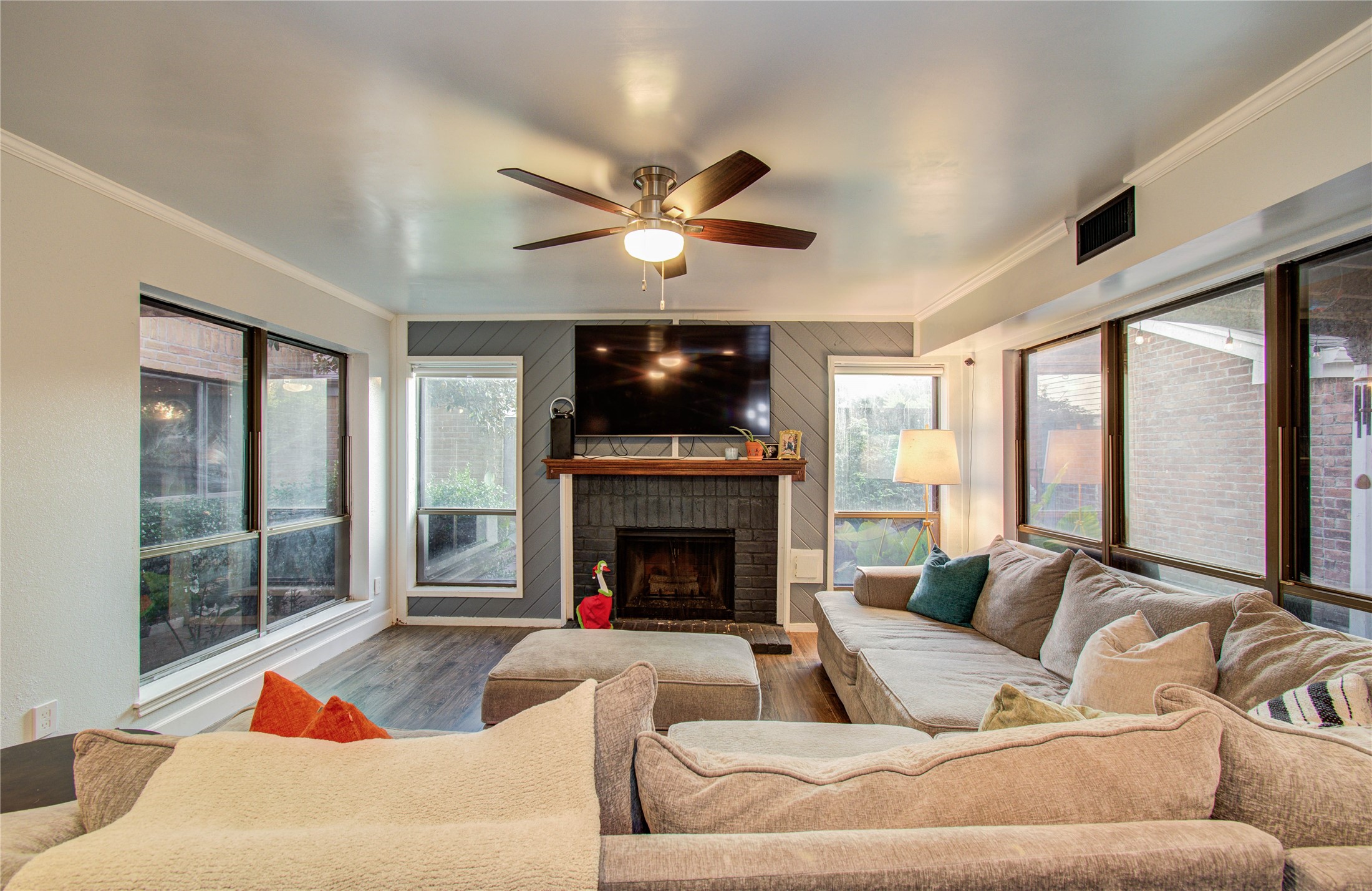 16707 Fernwood Way Houston, TX 77058 - Photo 23 of 46 a living room with furniture and a fireplace