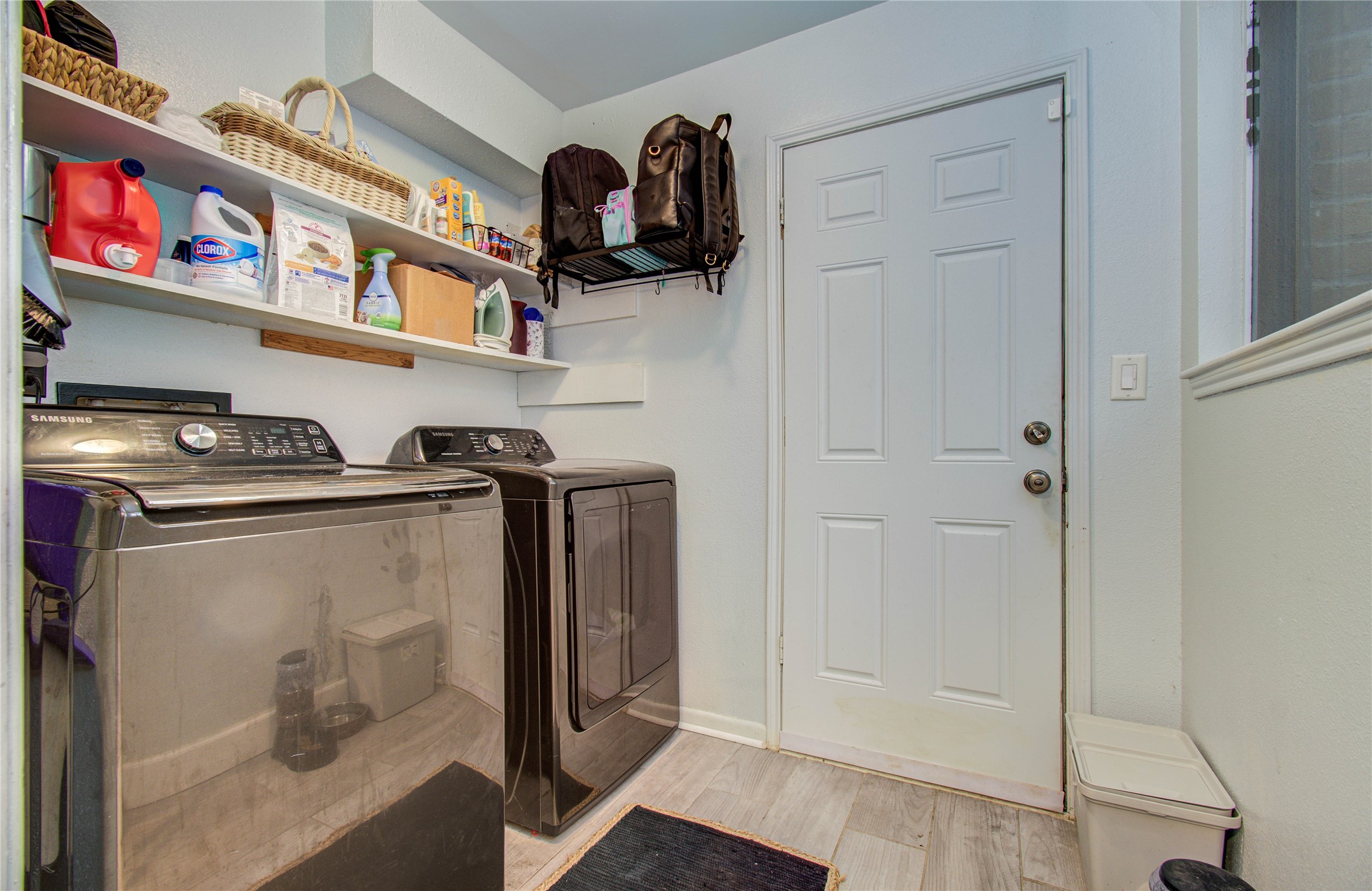 16707 Fernwood Way Houston, TX 77058 - Photo 26 of 46 a kitchen with stainless steel appliances granite countertop a refrigerator and a sink