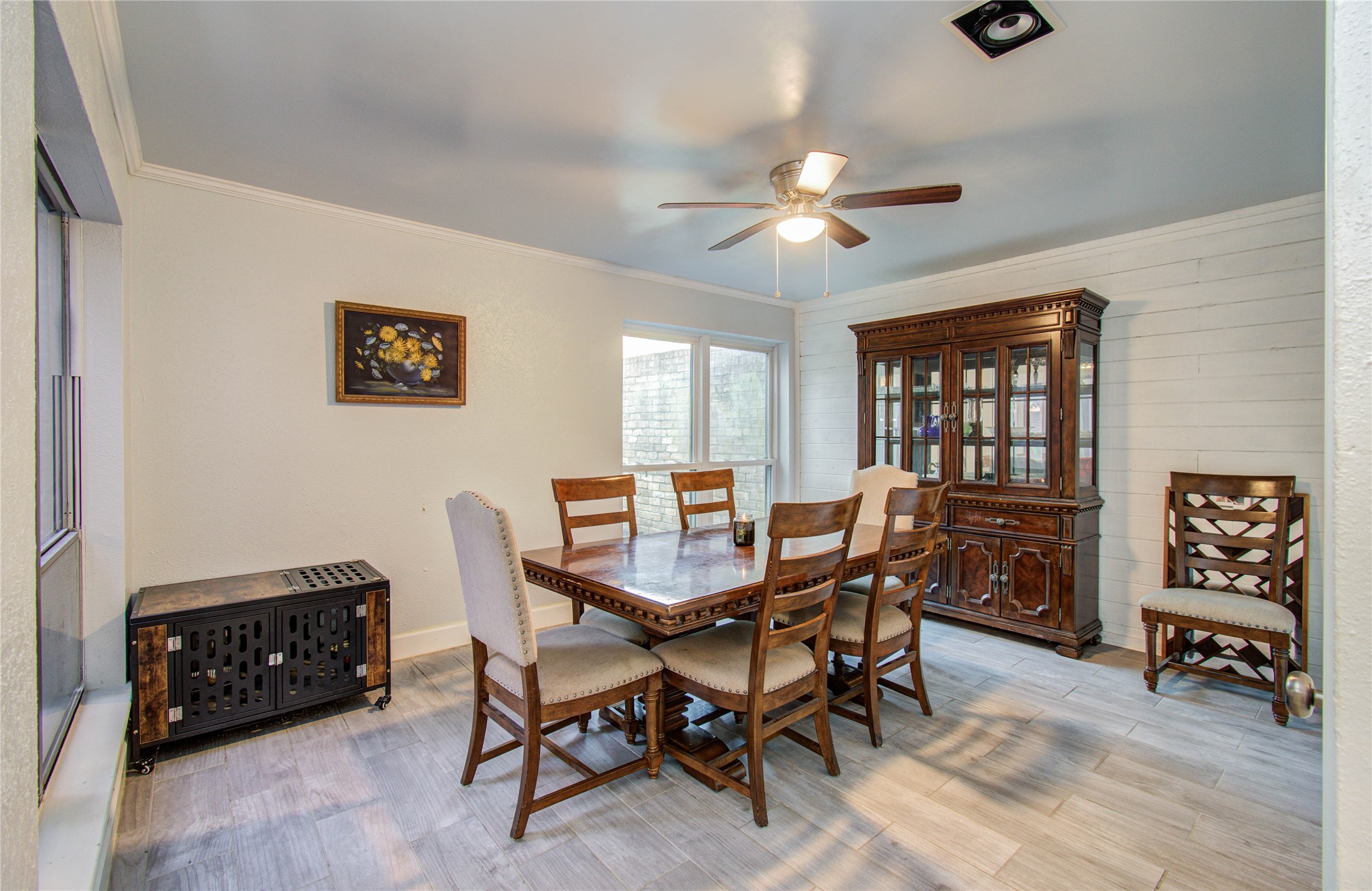 16707 Fernwood Way Houston, TX 77058 - Photo 3 of 46 a view of a dining room with furniture and chandelier