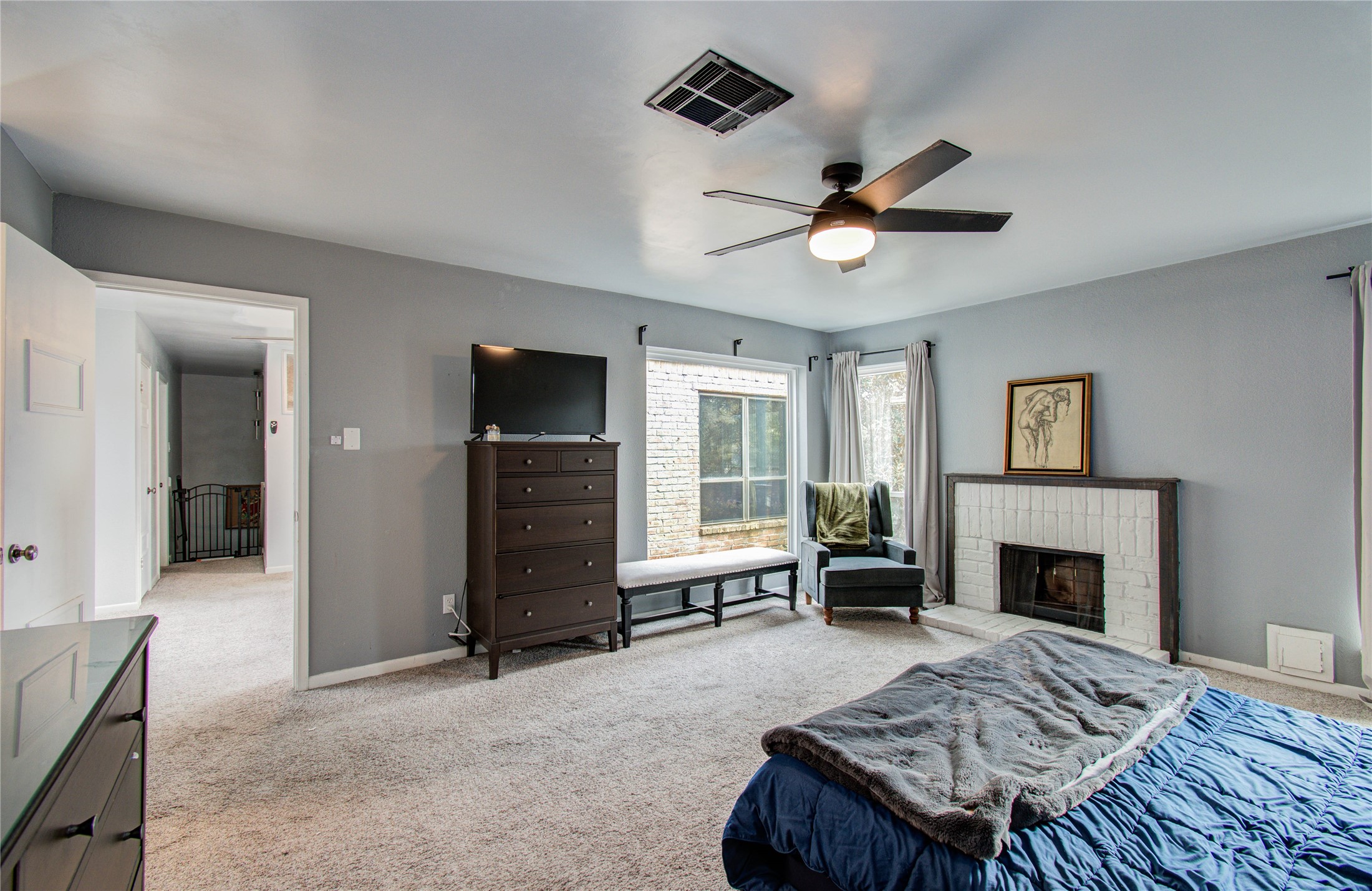 16707 Fernwood Way Houston, TX 77058 - Photo 36 of 46 a living room with furniture and a fireplace