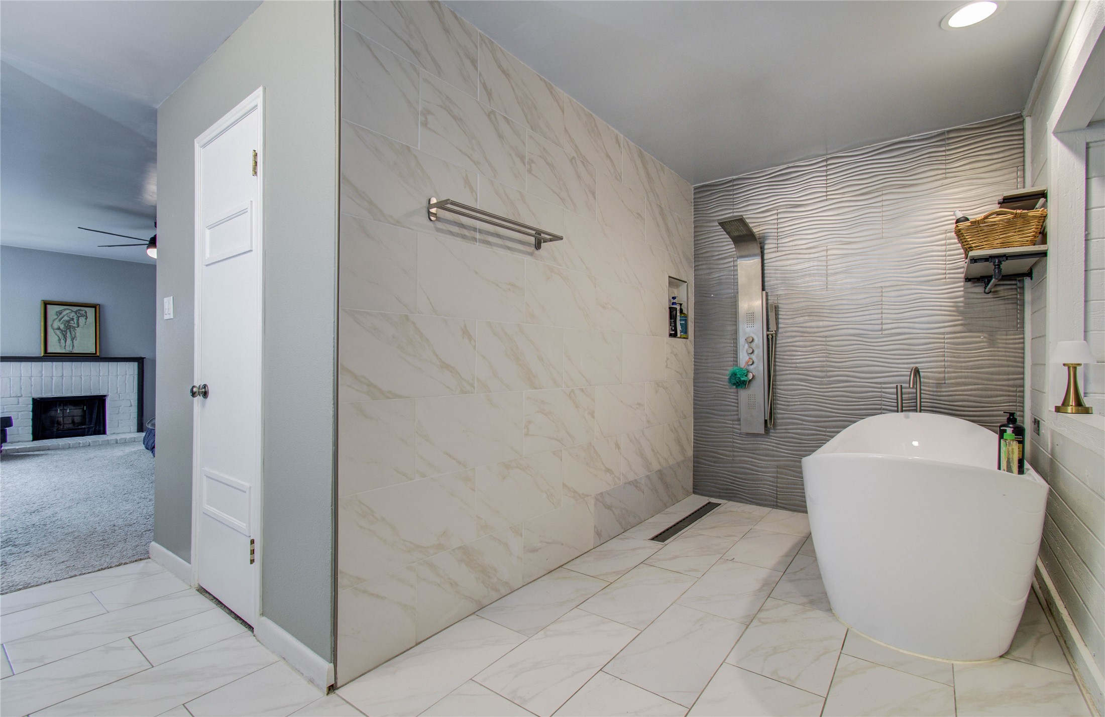 16707 Fernwood Way Houston, TX 77058 - Photo 39 of 46 a spacious bathroom with a bathtub and shower