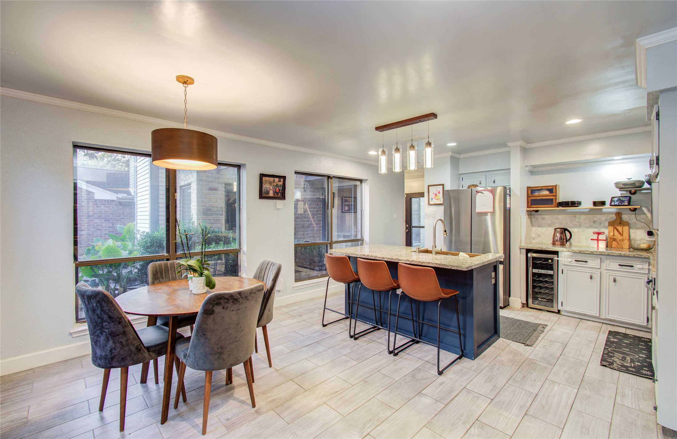 16707 Fernwood Way Houston, TX 77058 - Photo 4 of 46 a dining room with furniture and window
