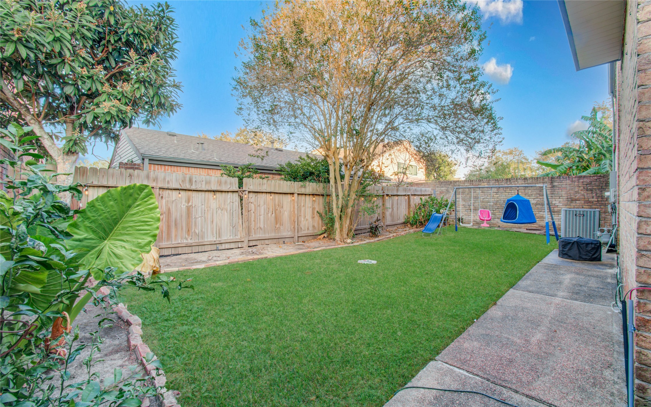 16707 Fernwood Way Houston, TX 77058 - Photo 42 of 46 a view of a garden with a slide