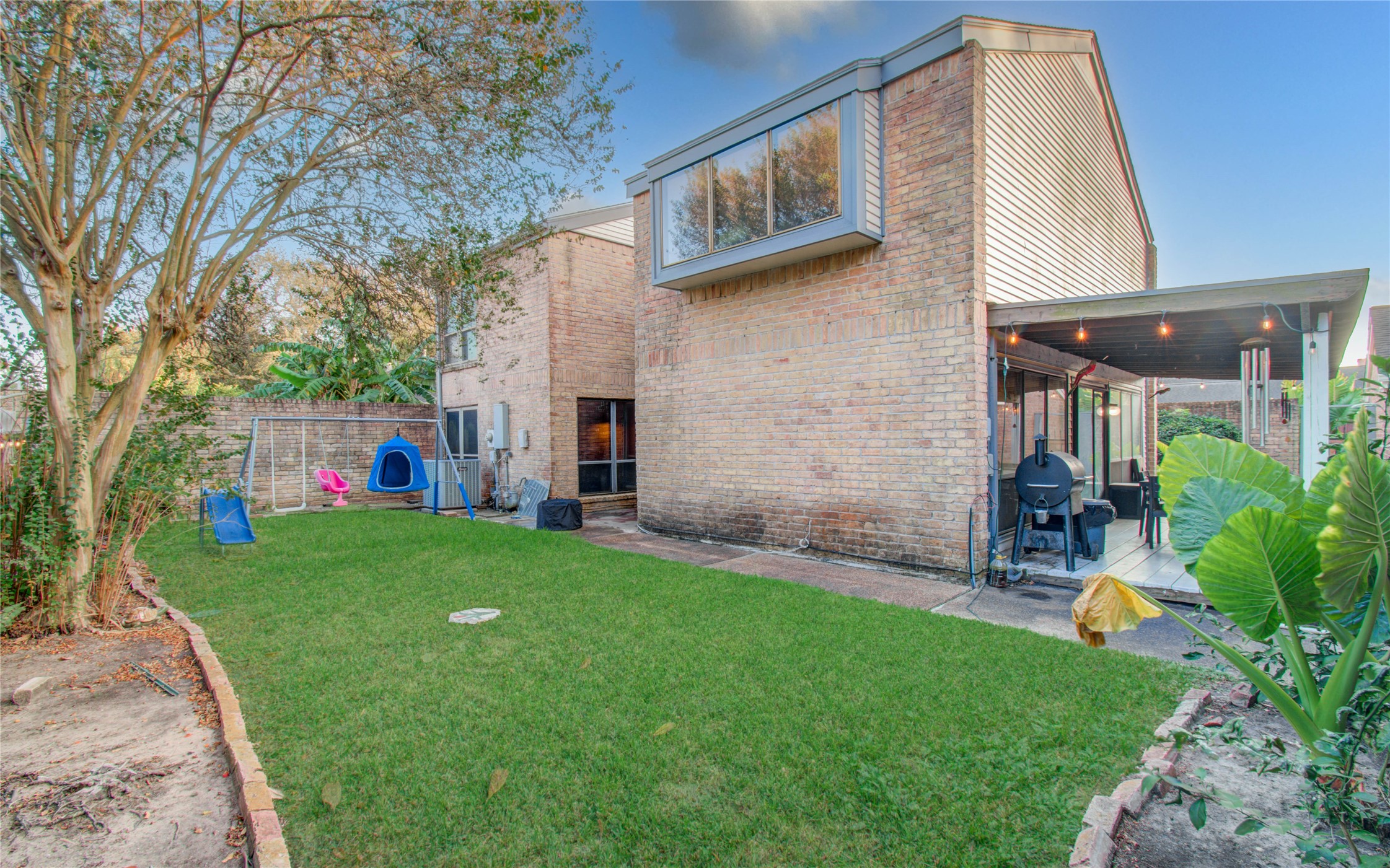 16707 Fernwood Way Houston, TX 77058 - Photo 43 of 46 a view of a house with backyard and sitting area