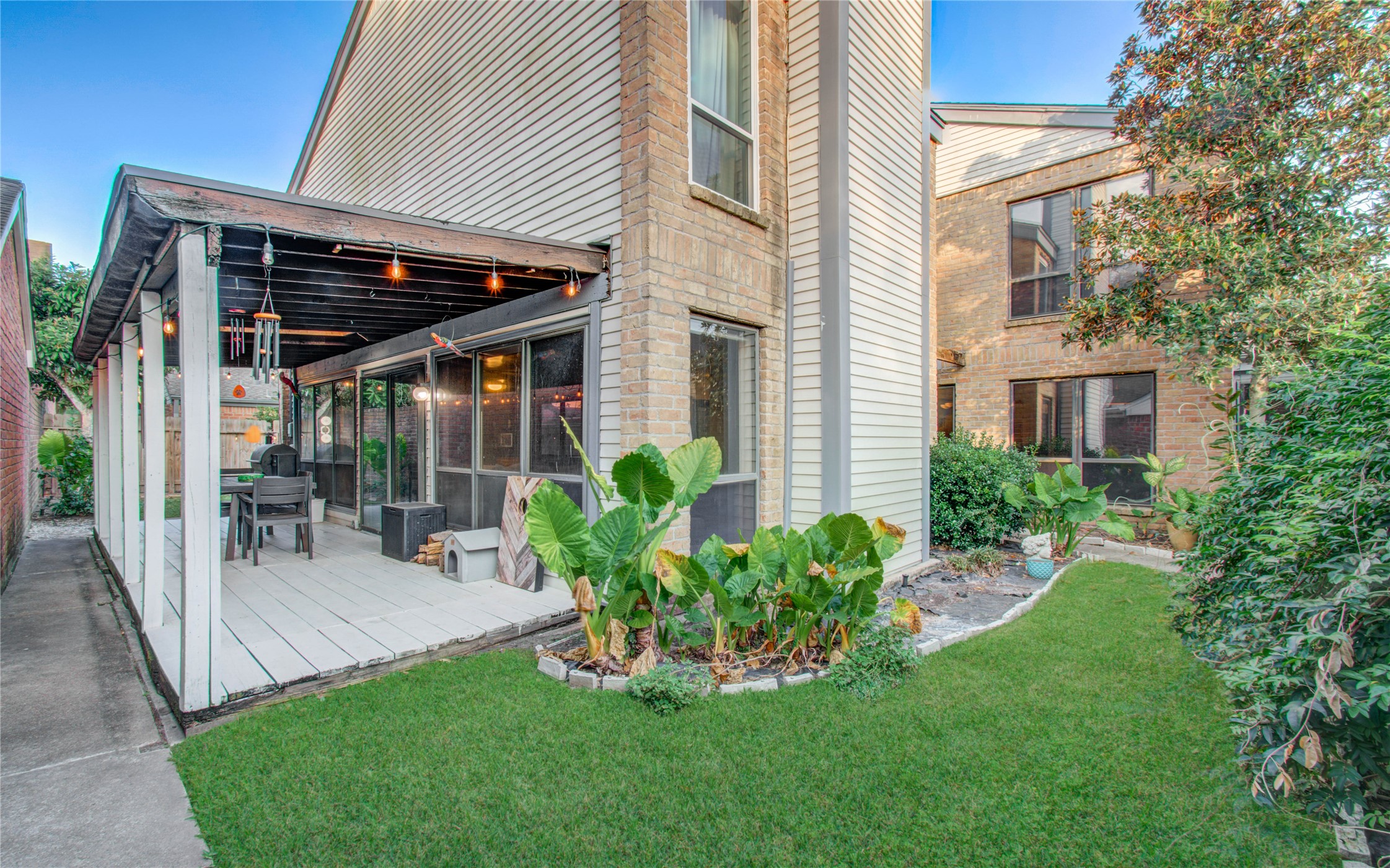 16707 Fernwood Way Houston, TX 77058 - Photo 9 of 46 a view of a house with backyard and sitting area