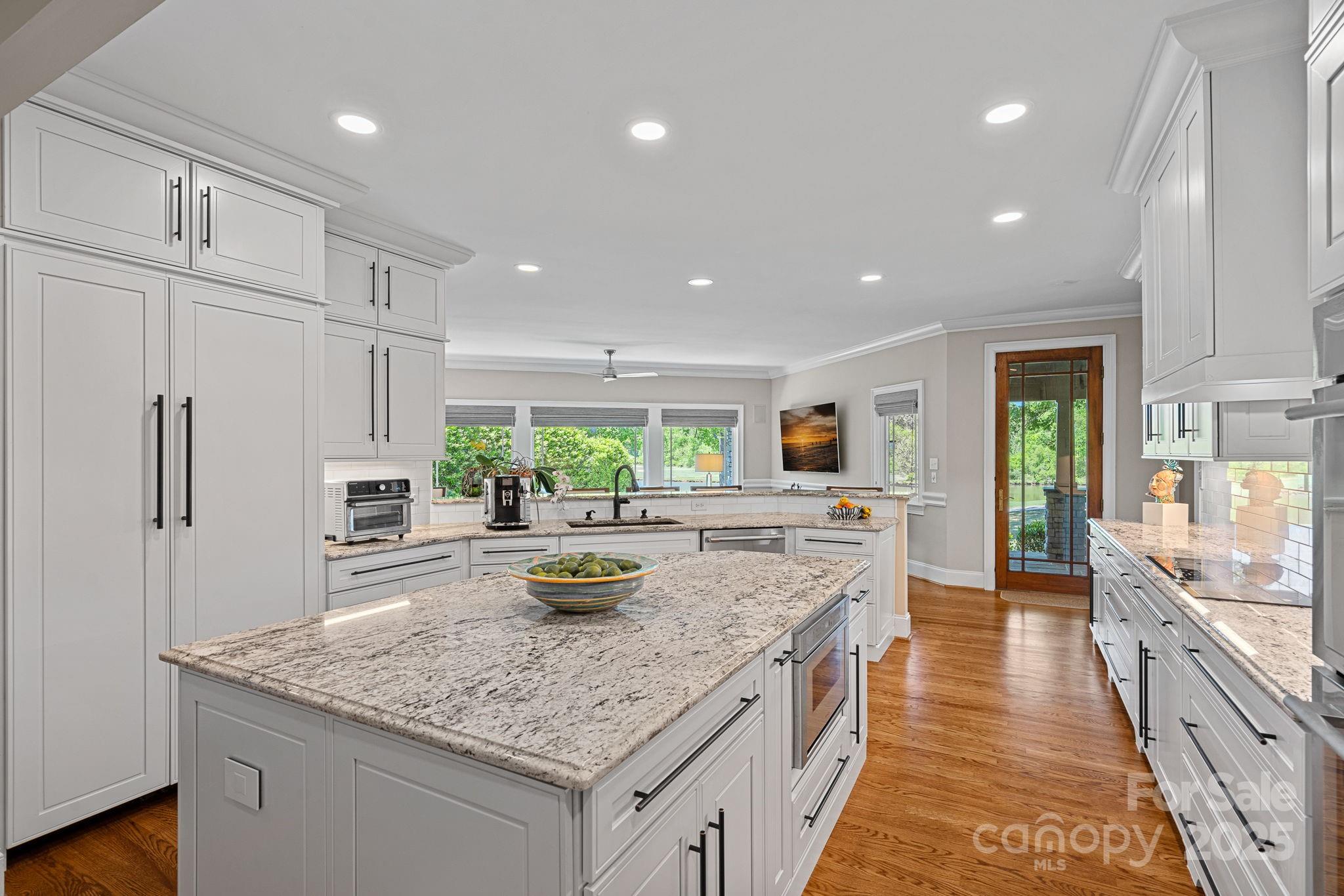 19501 River Falls Drive Davidson, NC 28036 - Photo 14 of 47 a kitchen with sink stove and refrigerator