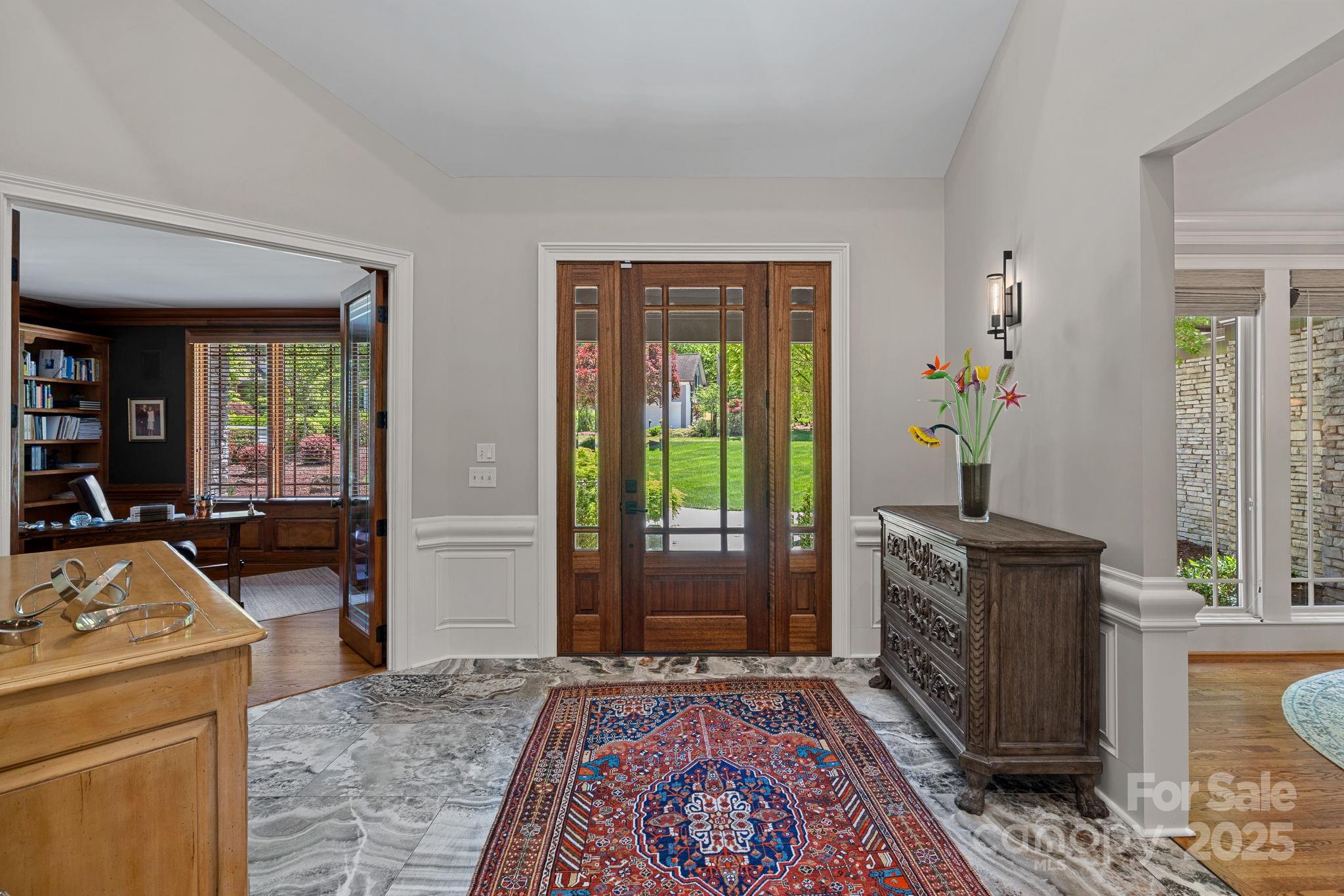19501 River Falls Drive Davidson, NC 28036 - Photo 2 of 47 a living room with furniture rug and wooden floor