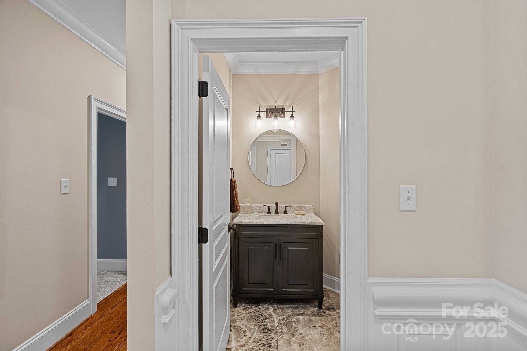 19501 River Falls Drive Davidson, NC 28036 - Photo 22 of 47 a bathroom with a sink and a mirror