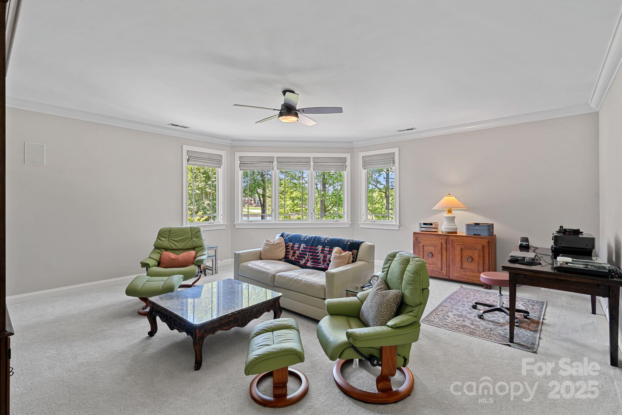 19501 River Falls Drive Davidson, NC 28036 - Photo 28 of 47 a living room with furniture and a window