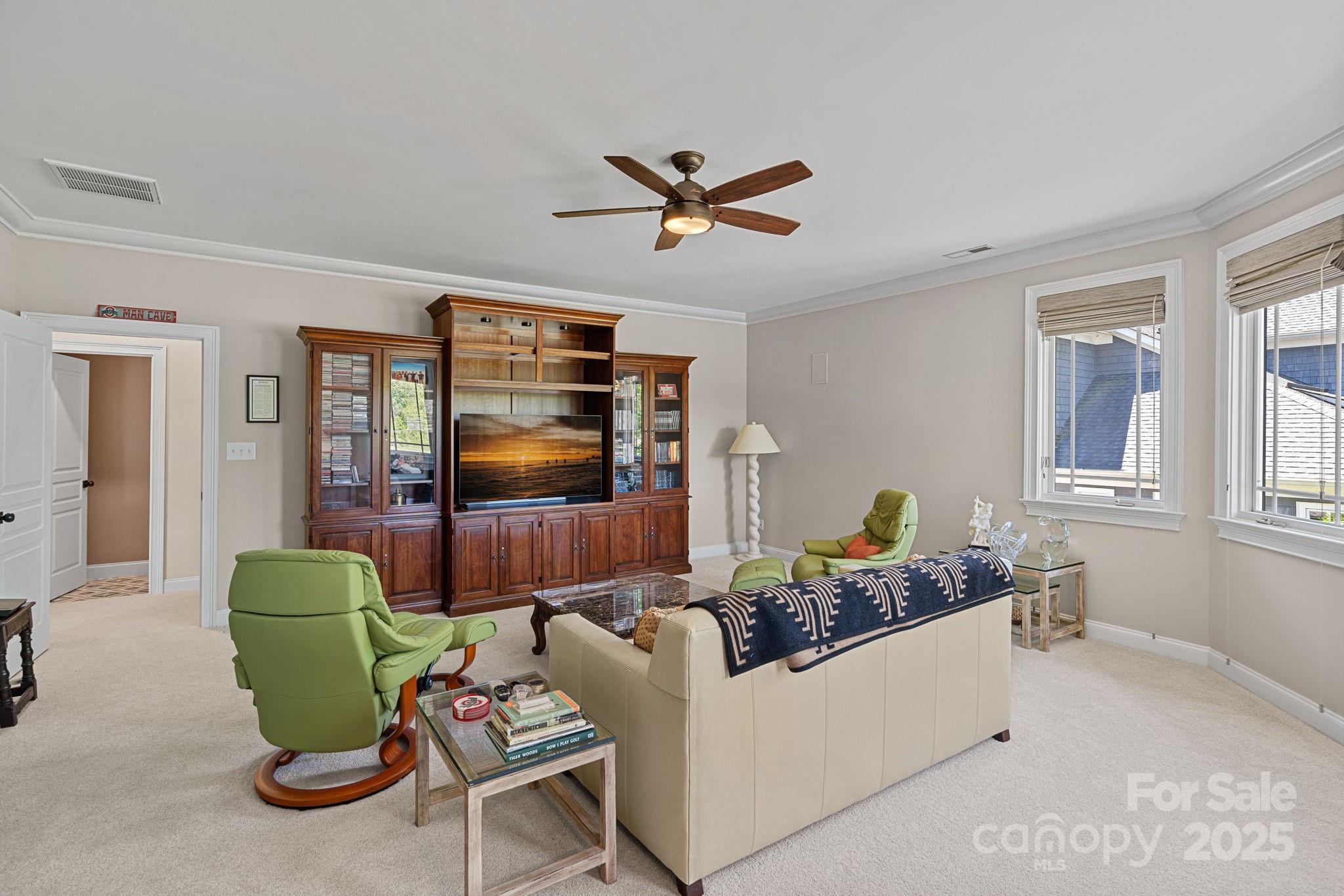 19501 River Falls Drive Davidson, NC 28036 - Photo 29 of 47 a living room with furniture and a window