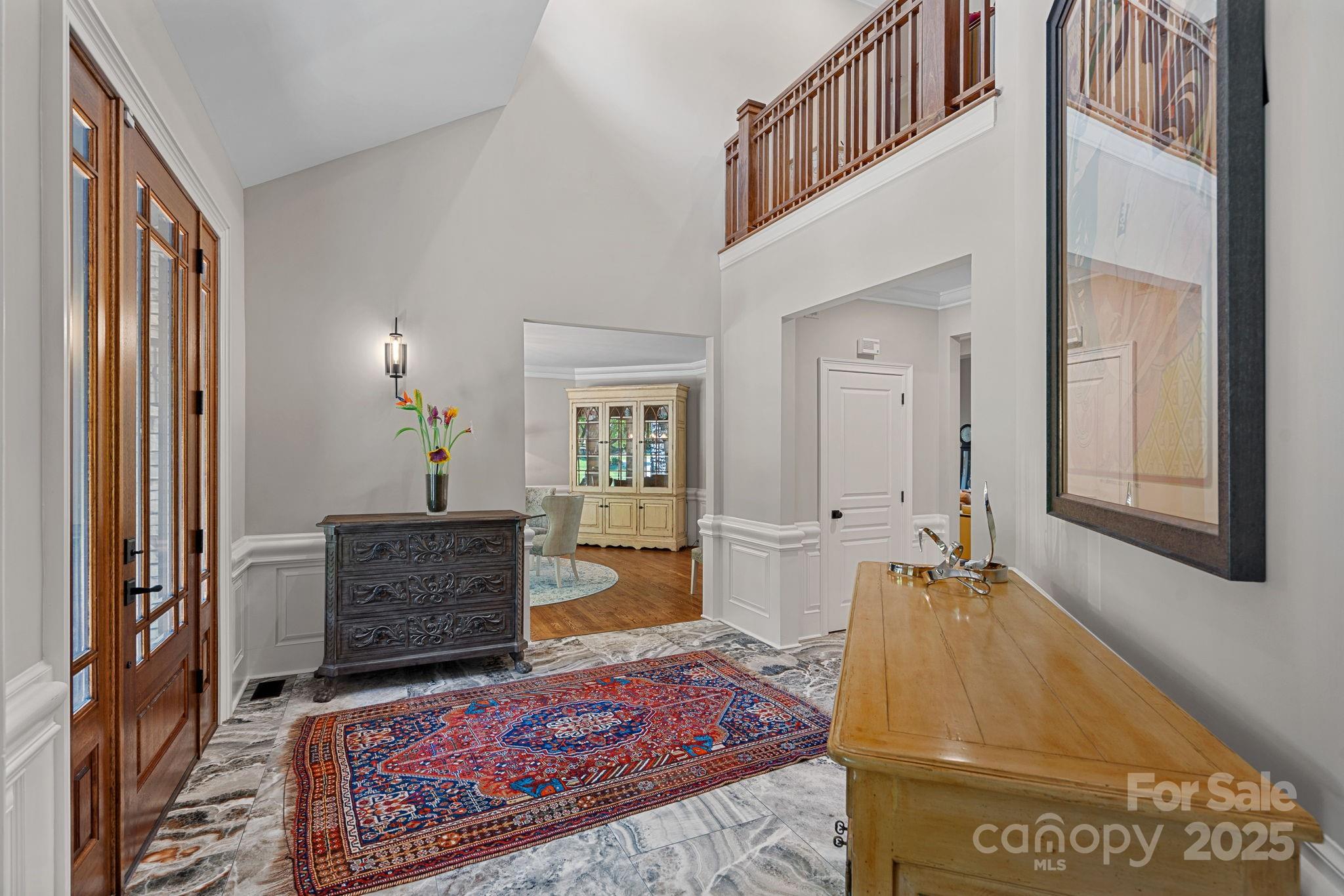 19501 River Falls Drive Davidson, NC 28036 - Photo 3 of 47 a living room with furniture