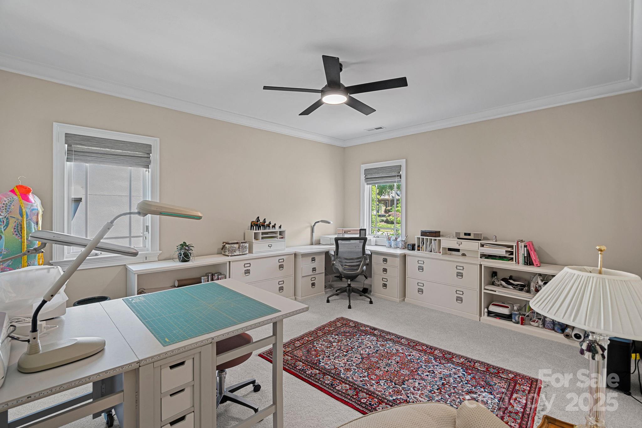 19501 River Falls Drive Davidson, NC 28036 - Photo 31 of 47 a view of a workspace with furniture and window in a room
