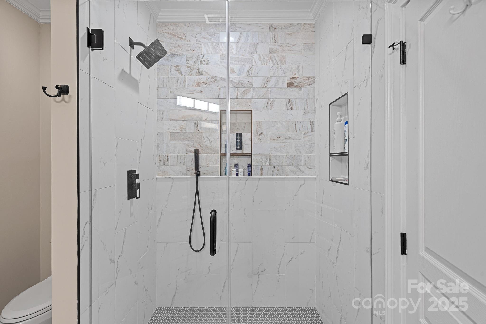 19501 River Falls Drive Davidson, NC 28036 - Photo 33 of 47 a bathroom with a shower