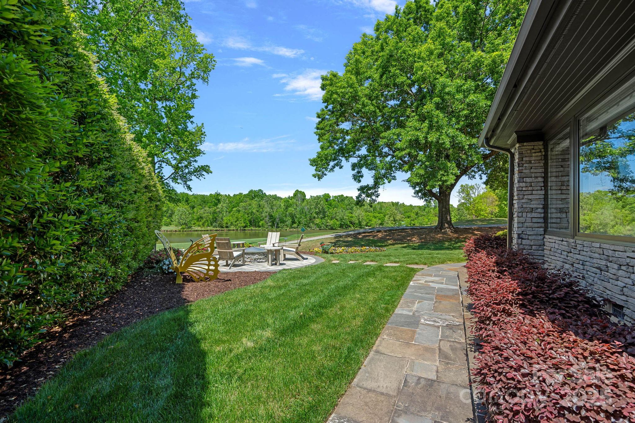 19501 River Falls Drive Davidson, NC 28036 - Photo 39 of 47 a view of a backyard with sitting area