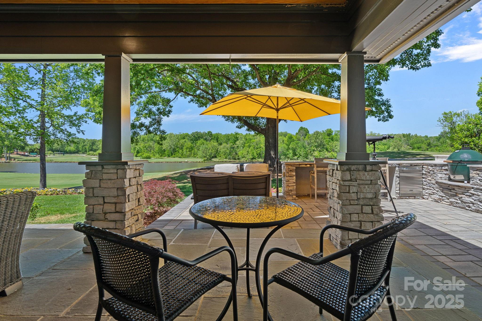 19501 River Falls Drive Davidson, NC 28036 - Photo 41 of 47 a view of a chairs and table in the patio