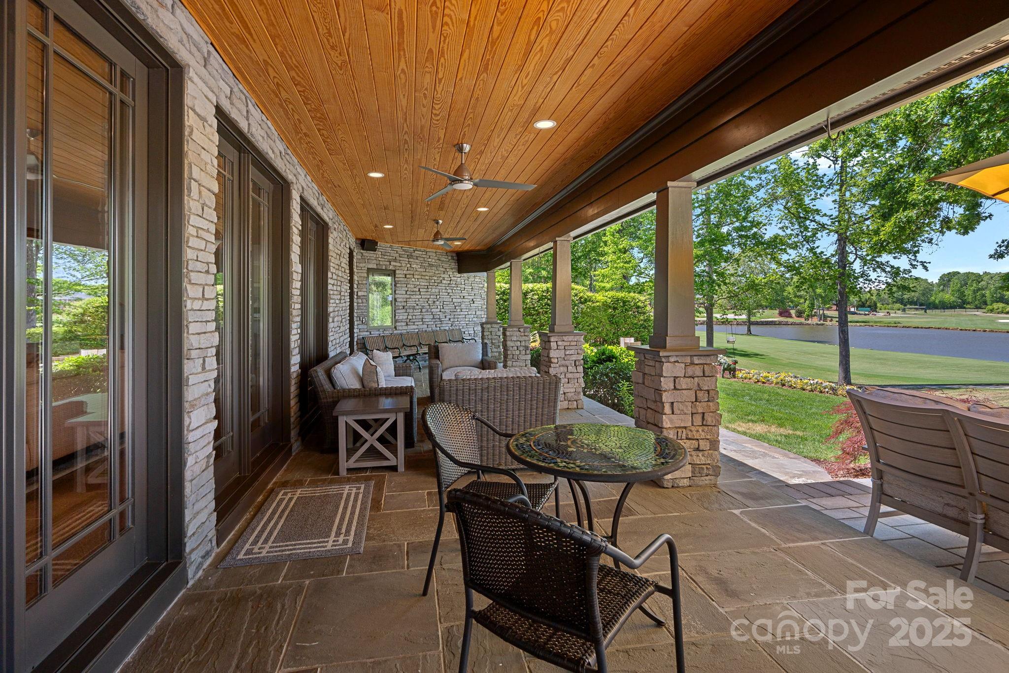19501 River Falls Drive Davidson, NC 28036 - Photo 45 of 47 a patio with yard glass top table and chairs