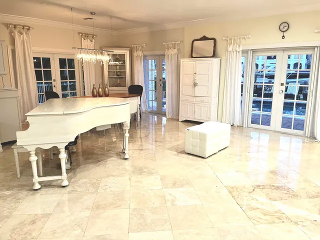 a view of a livingroom with furniture and window